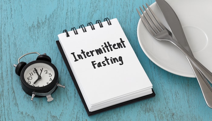 Intermittent fasting written on notebook | DNAfit Blog