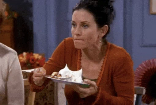 Monica from Friends enjoying her dessert